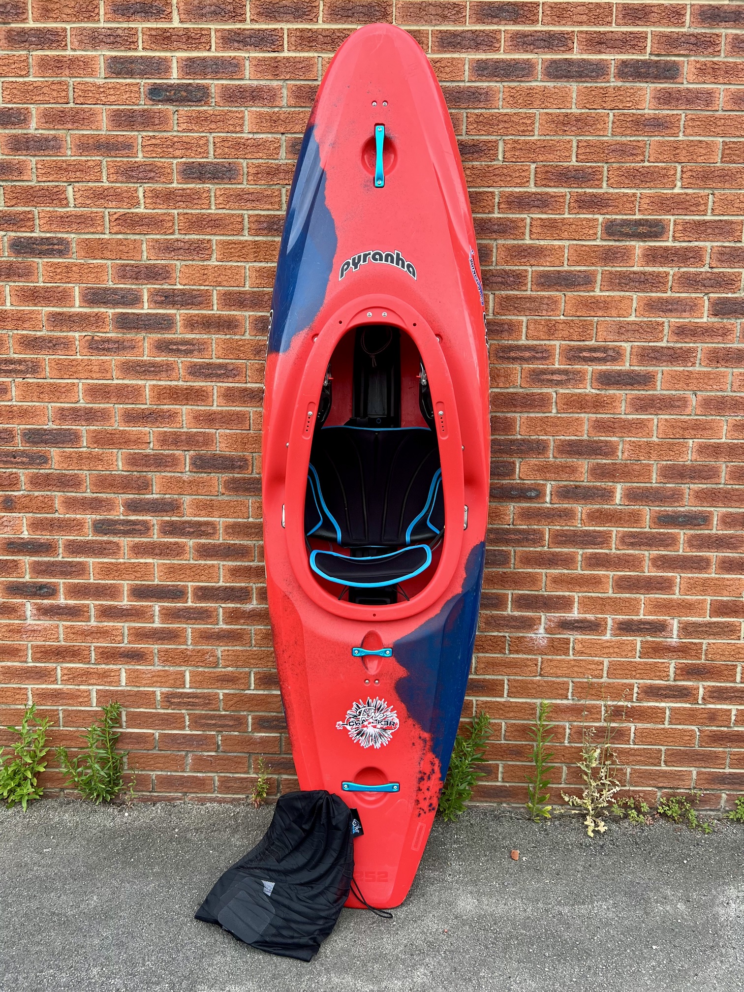 Preowned Pyranha Firecracker Stout 2 Kayak 252 Large Rosella Red Deck