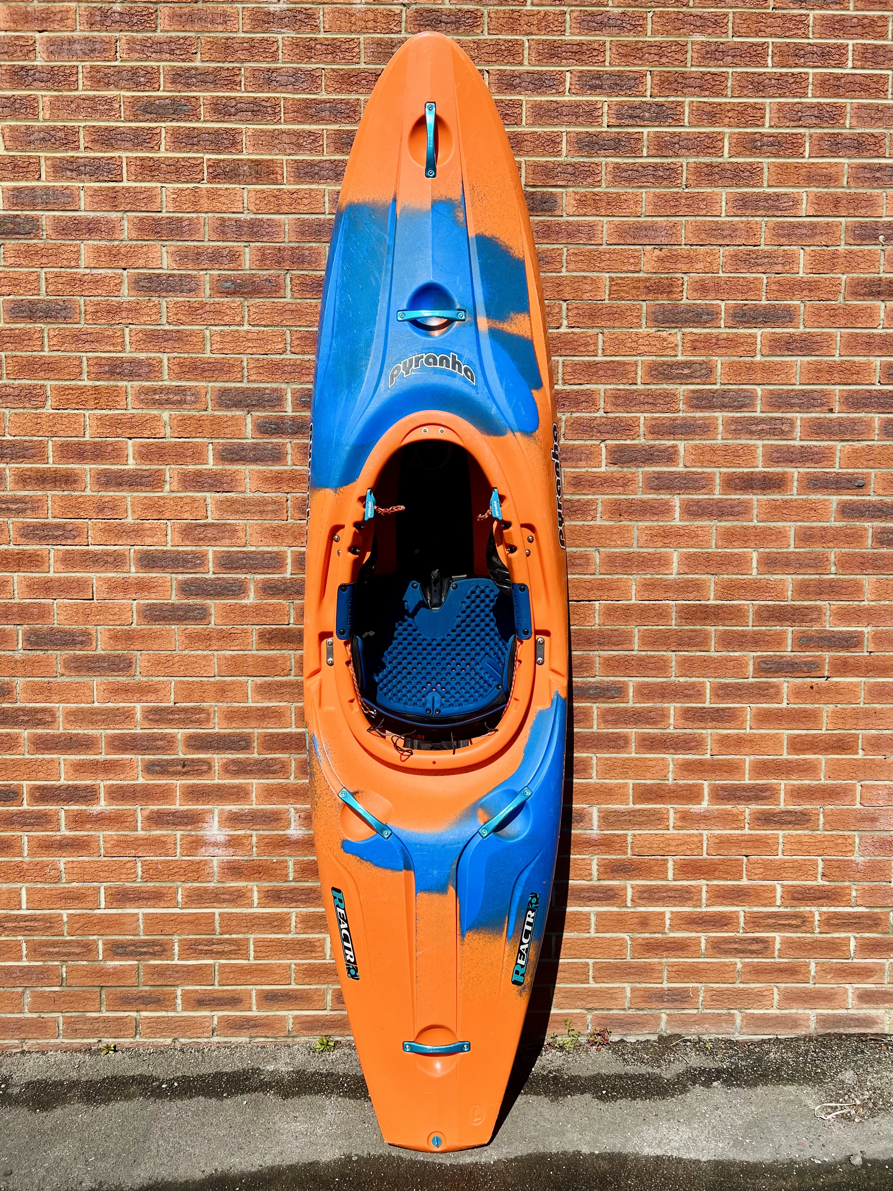 Preowned Pyranha ReactR Elite Kayak Large Orange/Blue/Blue Deck